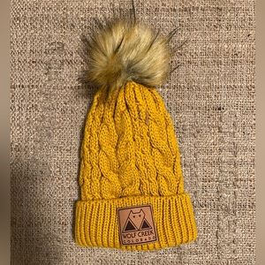 Warm winter hat with pouf